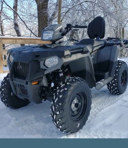 ATV on a snowy trail at Bigfoot ATV Adventures in New Straitsille, Perry County,Ohio