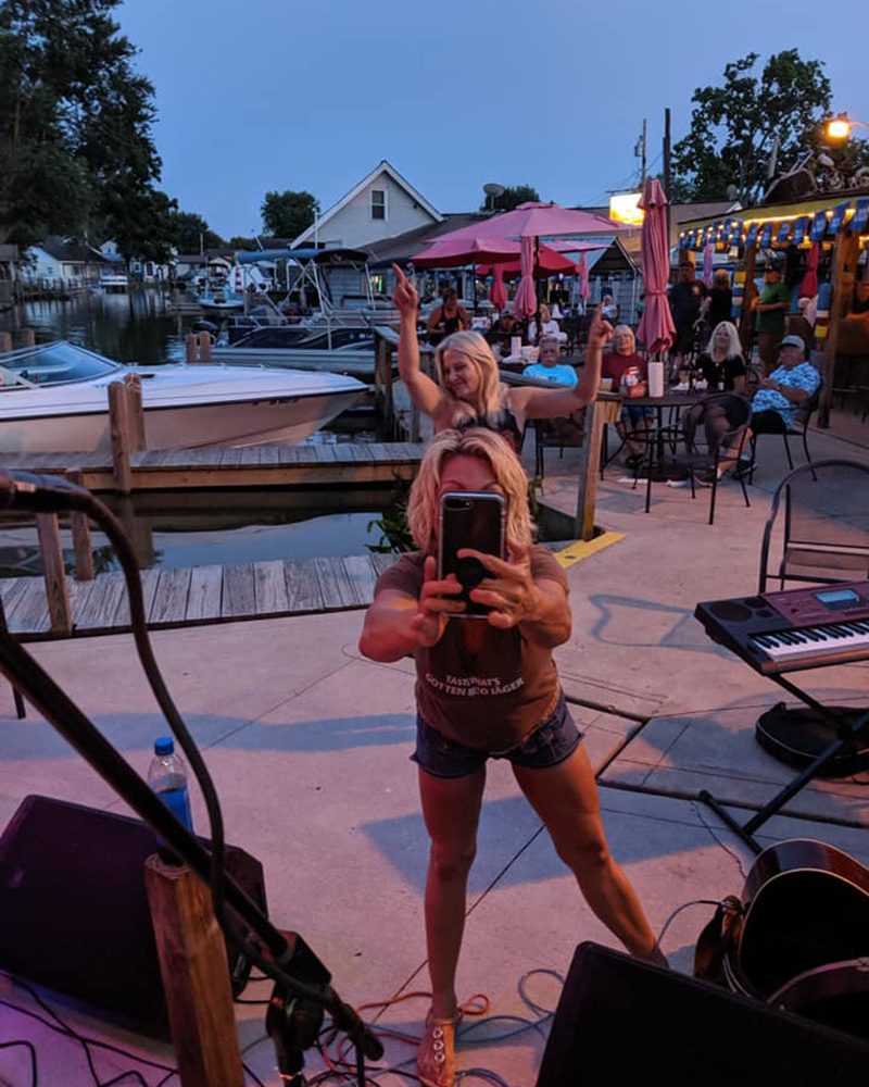 Crowd on the patio deck at The Copper Penny in Thornville at Buckeye Lake, Perry County, Ohio.