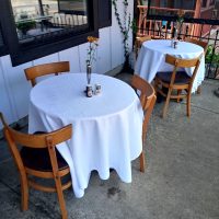 Patio seating at Épicerie et Les Fleurs, a French bistro-style restaurant in Somerset, Perry County, Ohio.