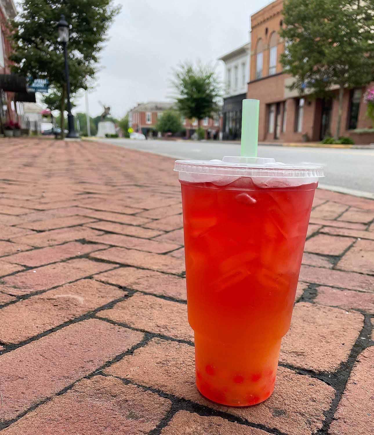 Beverage sitting on sidewalk outside Generally Fit, a smoothie, tea and coffee shop in Somerset, Perry County, Ohio.