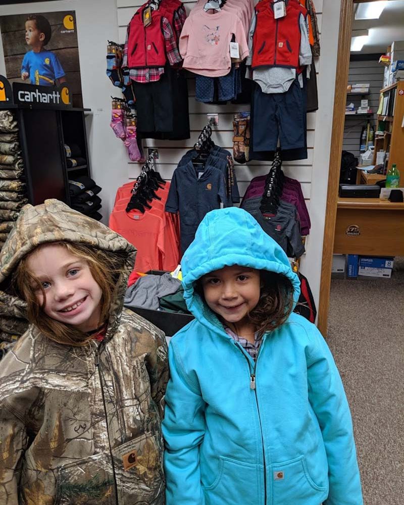 Children wearing outdoor clothing at Lake's End Special T's in Thornville, Perry County, Ohio.