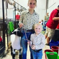 Children at Perry County Fair wearing shirts from (Mid)Western Second Hand shop in Somerset, Perry County, Ohio.