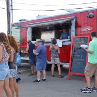 People gathered outside Mt. Airy Beef Food Truck.