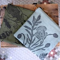 Handprinted zipped bags by Moonville Print Shop inside Ohio's Winding Road Marketplace in Shawnee, Perry County, Ohio