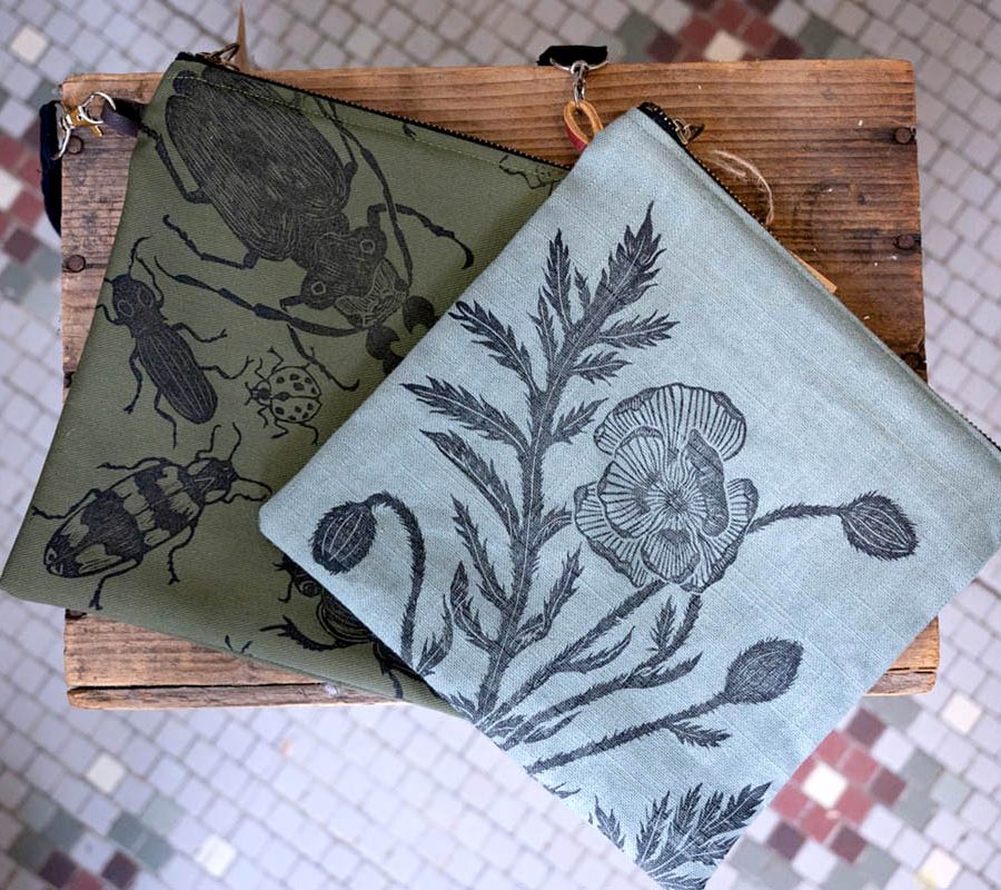 Handprinted zipped bags by Moonville Print Shop inside Ohio's Winding Road Marketplace in Shawnee, Perry County, Ohio