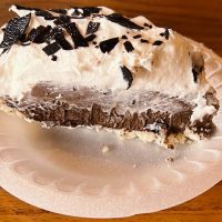 Slice of chocolate cream pie with whipped cream topping and chocolate shavings from Peach's Place Family Restaurant in Crooksville, Perry County, Ohio