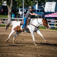 Young rider competing in horse riding at the Perry County Fair in New Lexington, Ohio