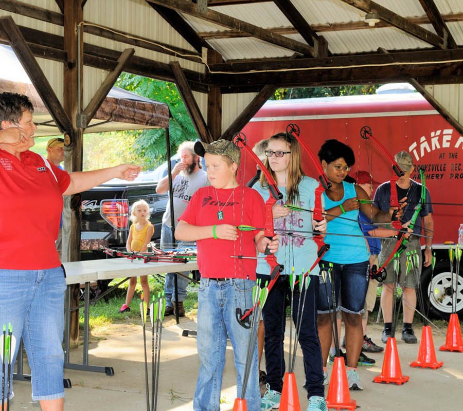 Children learning archery at the Perry County Gun Club in New Lexington, Perry County, Ohio