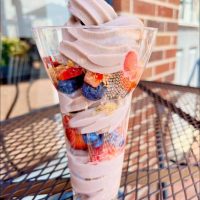 Tall strawberry frozen yogurt with fresh berries at Perrydise Frozen Yogurt in Somerset, Perry County, Ohio