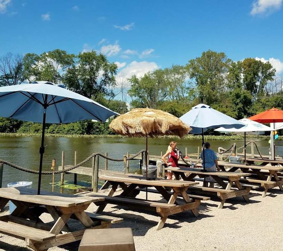 Umbrellas and picnic tables dockside at the Port Lounge and Smokehouse in Thornville, Perry County, Ohio.