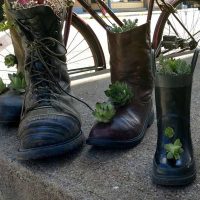 Boot planters on display outside Shawnee Mercantile in Shawnee, Perry County, Ohio