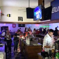 People enjoying the bar inside The Hangout in Crooksville, Perry County, Ohio.