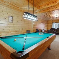 Game room with pool table inside Honeybee Hideaway in Logan, Monday Creek, southern Perry County, Ohio