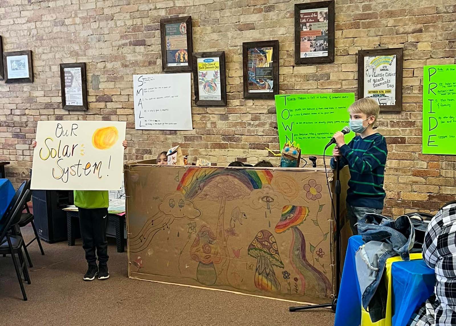 Child presenting at Tecumseh Theater during a 2021 Saturday Matinee session