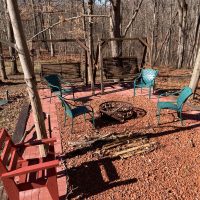 Outdoor patio with firepit at Woodacre Place in Perry County, Ohio.