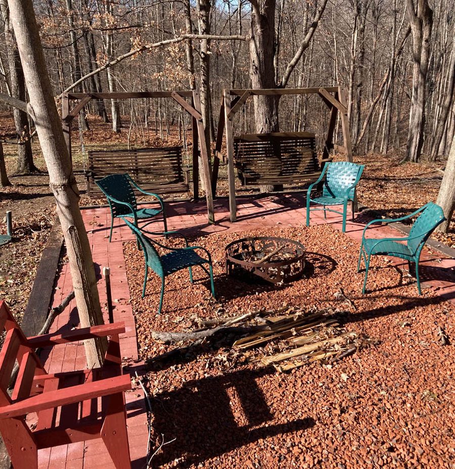 Outdoor patio with firepit at Woodacre Place in Perry County, Ohio.